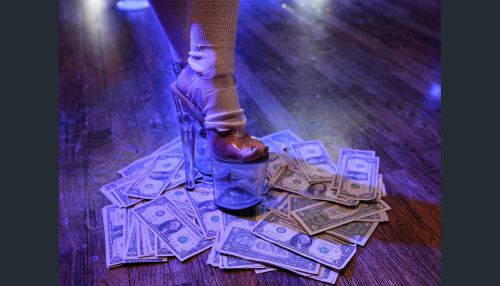False Nails and Dollar Bills: the Woman Photographing Strippers How They Want to be Seen
